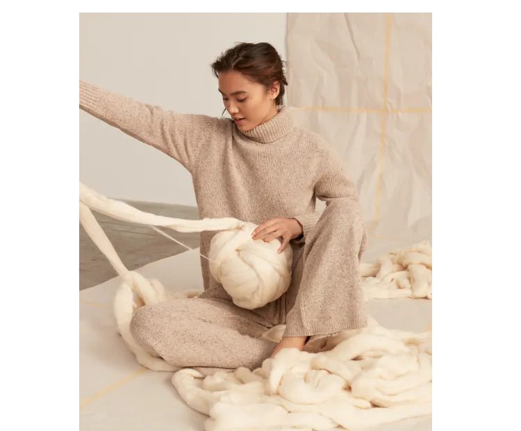 Rothy’s merino wool material shown with a model. 