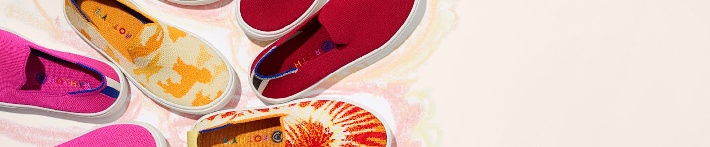 The Kids Sneaker in Bubblegum, Yellow Puppy Camo, and Dark Red from the top view.
