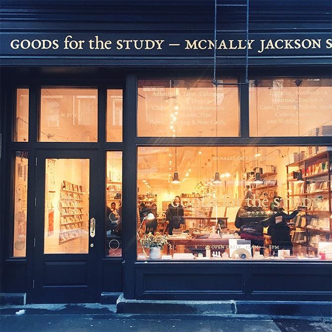 Lit up store view of McNally Jackson. 