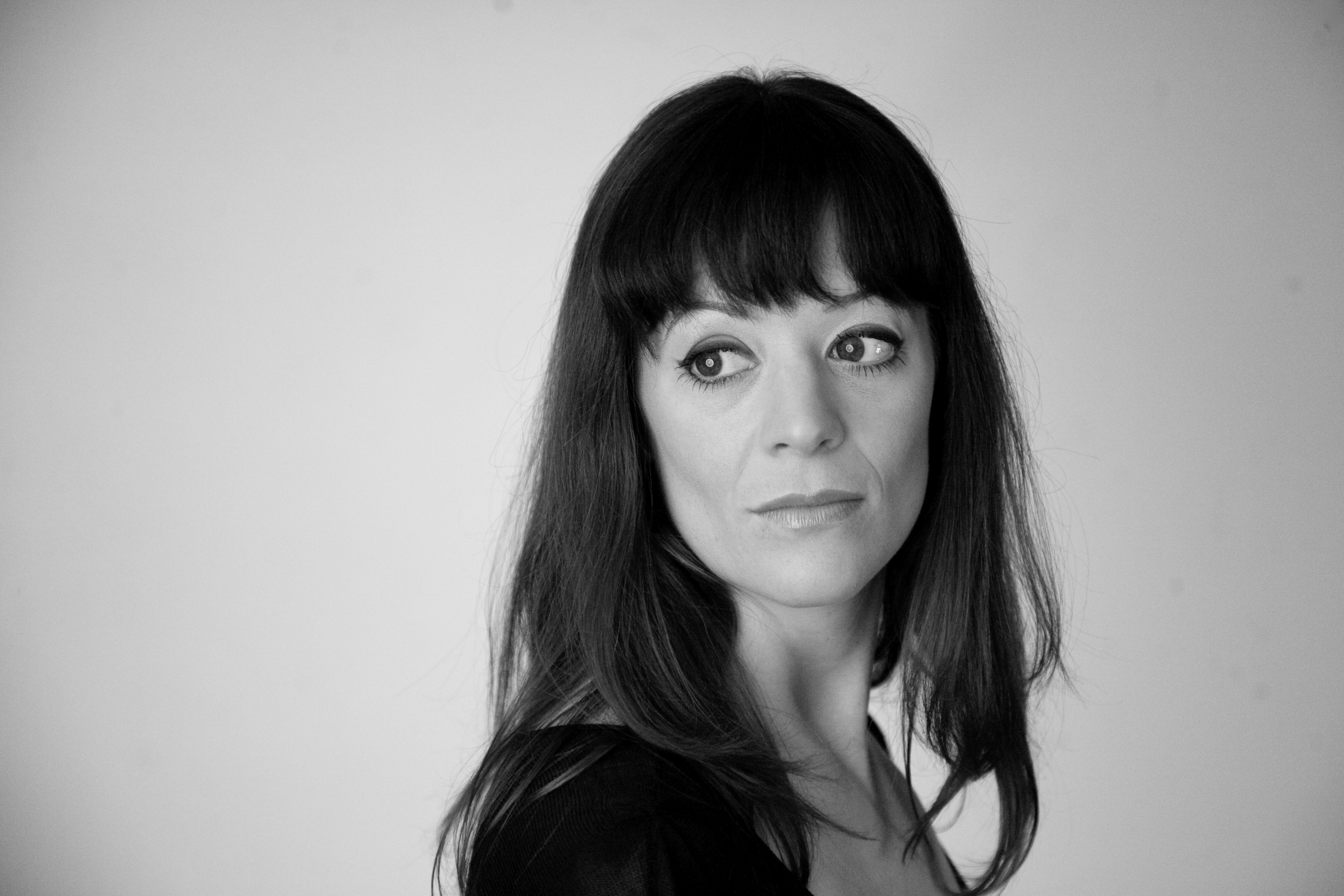 Black and white headshot of opera mezzo-soprano Miranda Westcott.