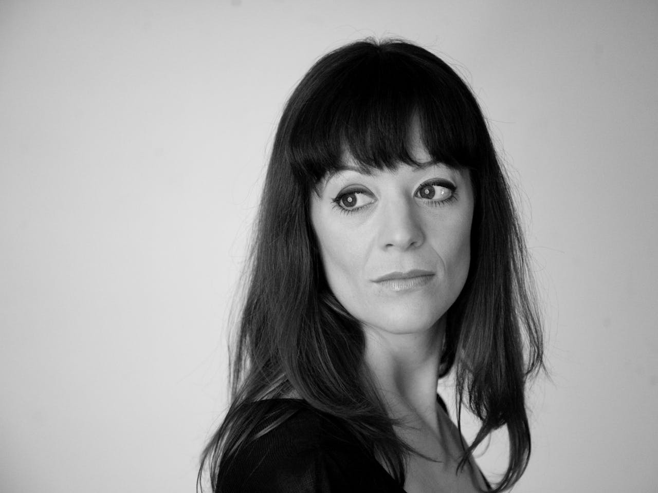 Black and white headshot of opera mezzo-soprano Miranda Westcott.