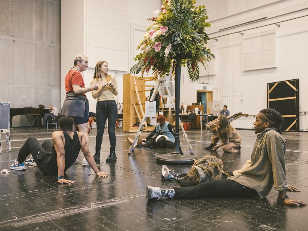 A group of artists rehearsing Alcina at the Royal Opera House.
