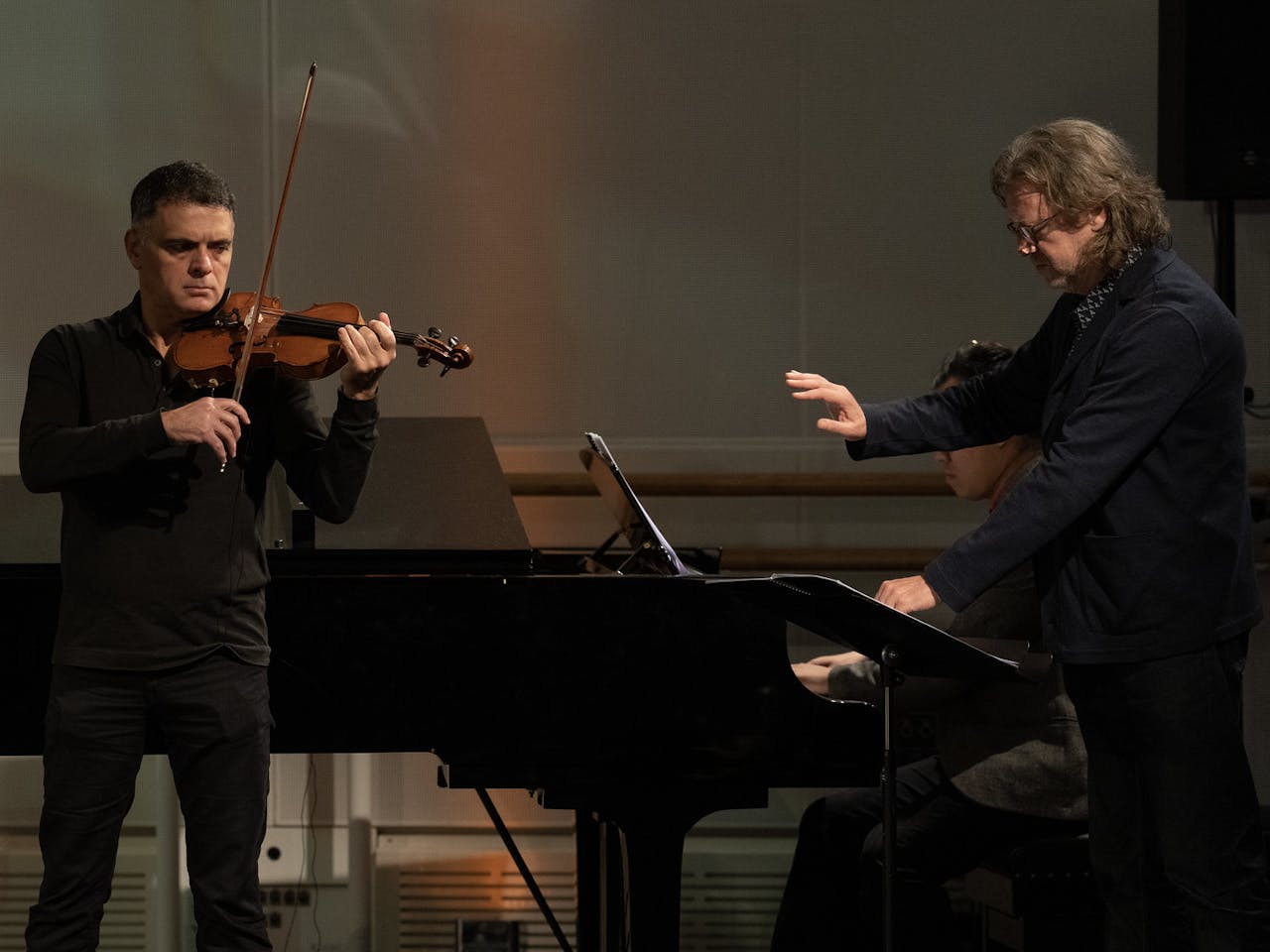 Koen conducting Vasily Vassilev whilst stood at a Grand Piano