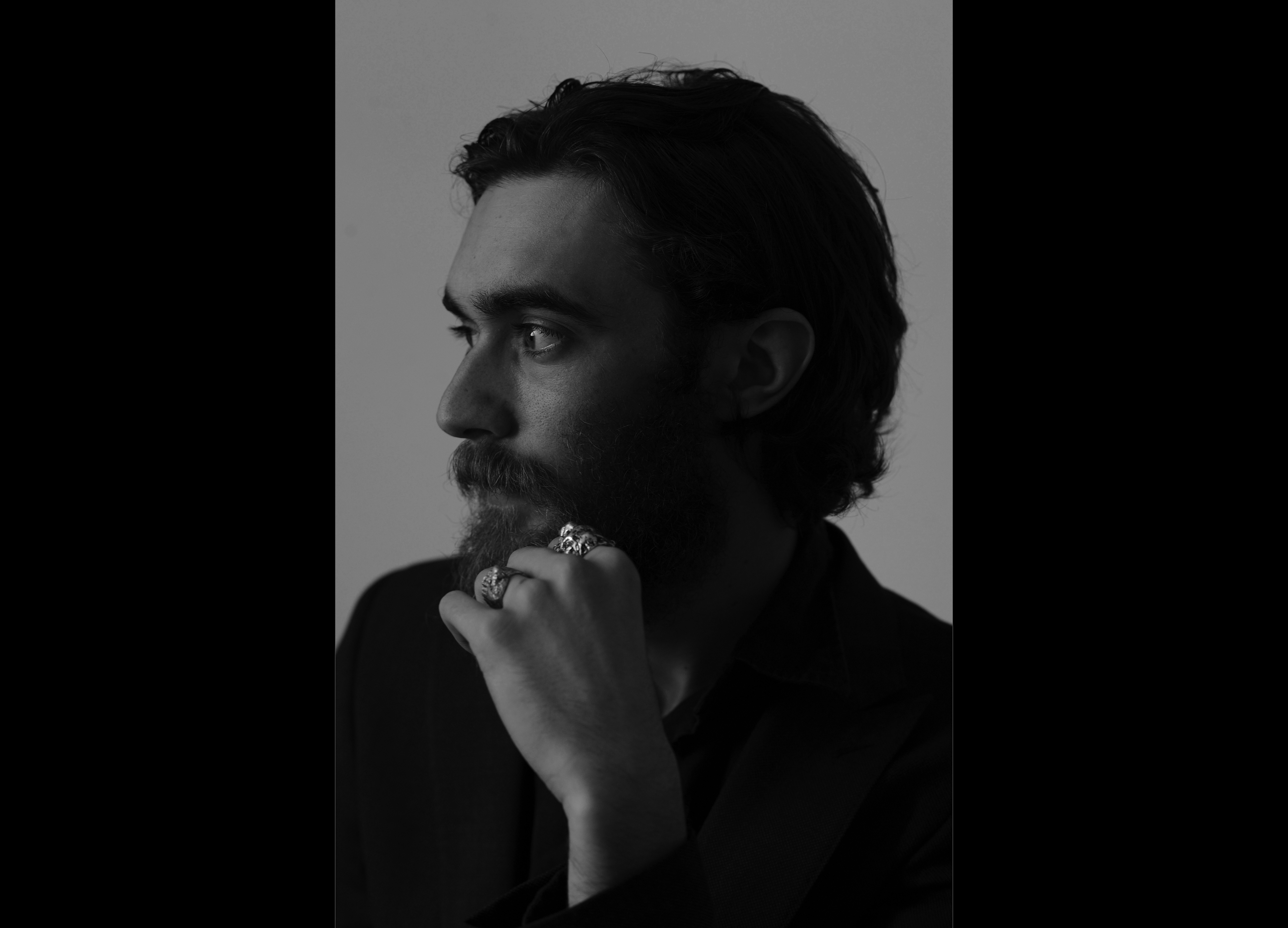 A black and white headshot of the composer Keaton Henson.