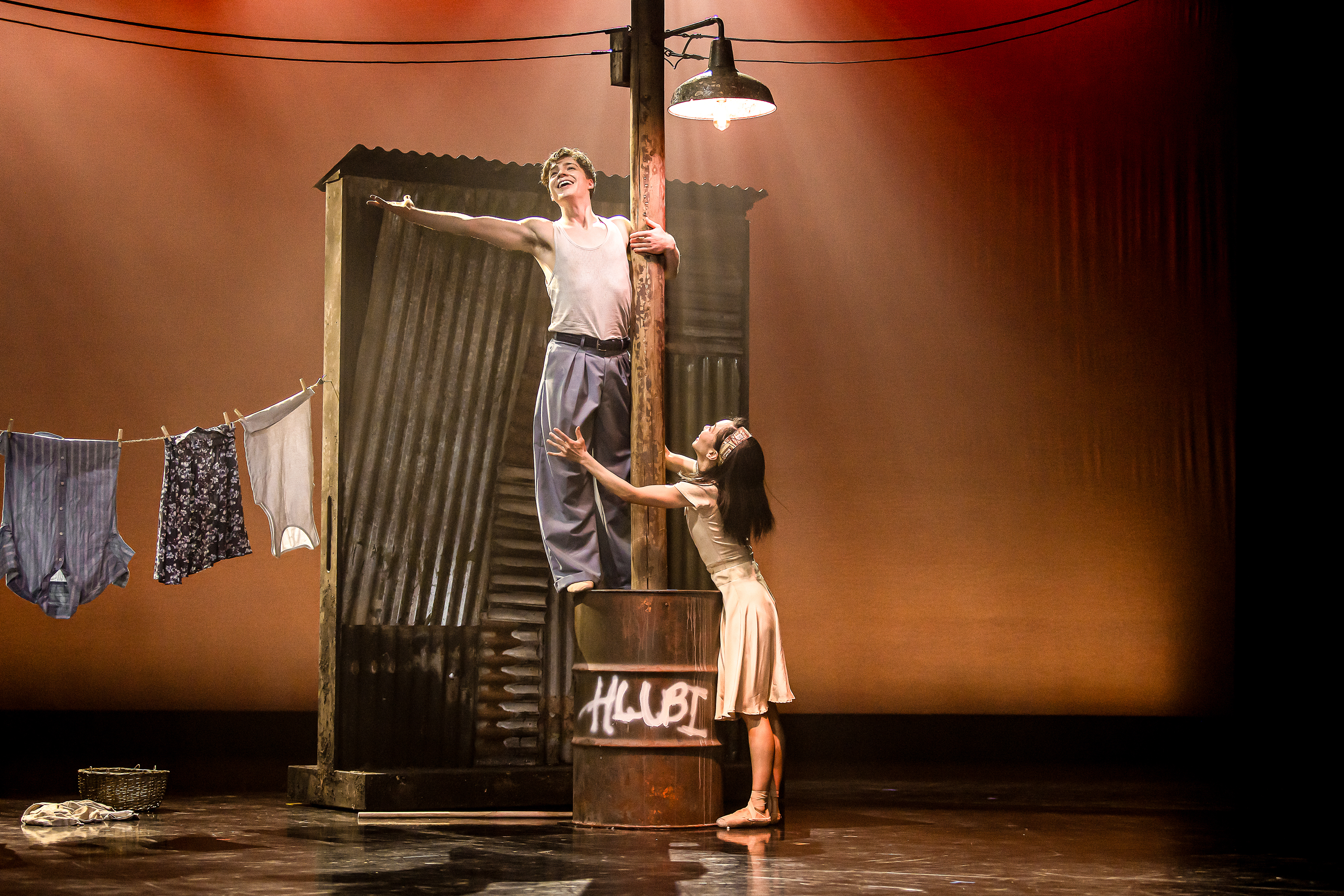 Two ballet dancers performing onstage in the production 'Fools'. 