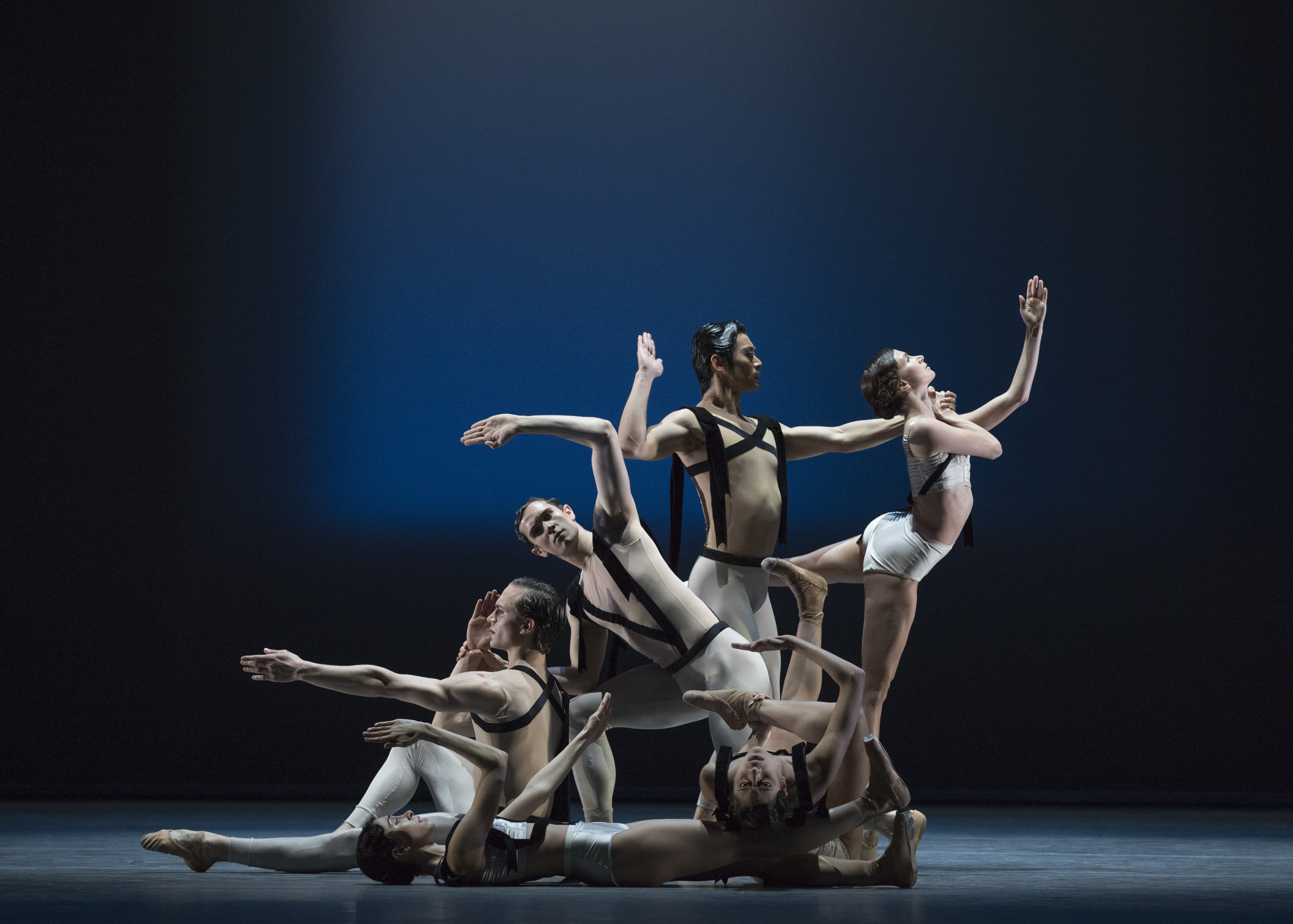 6 dancers strike a pose. 