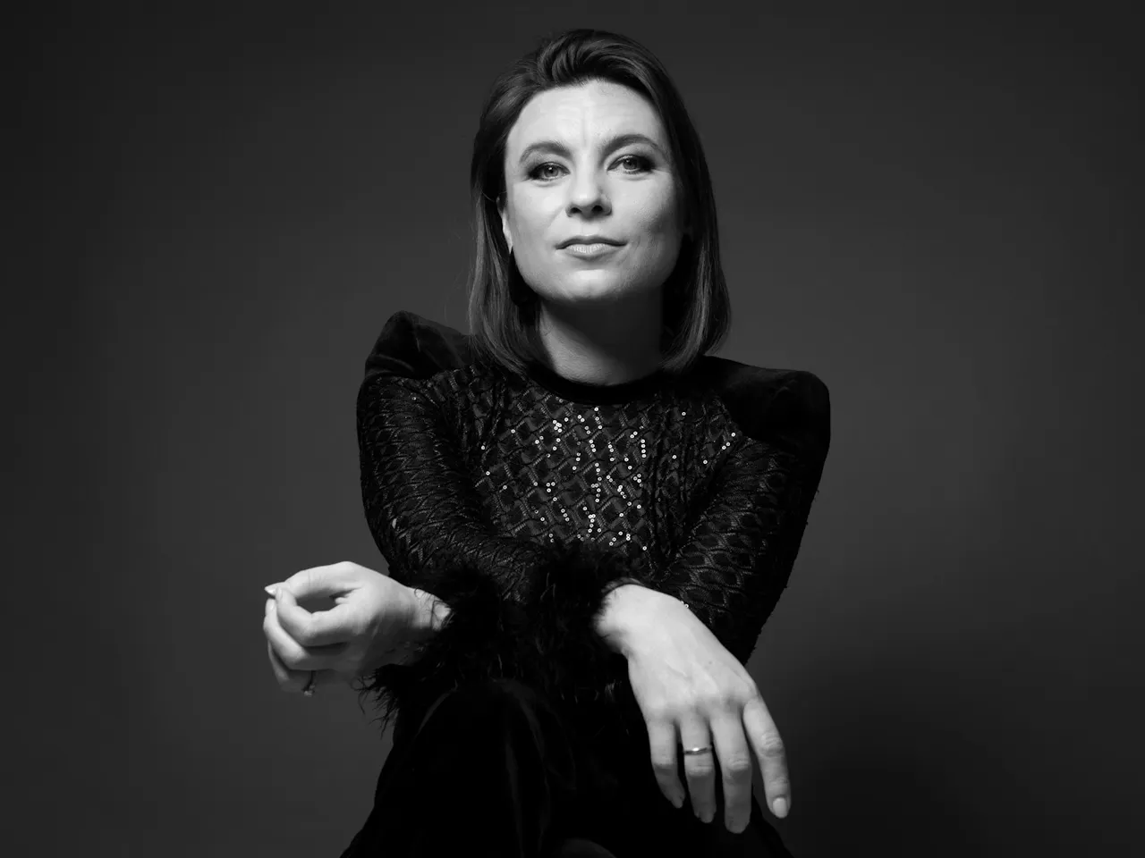 A black and white headshot of the soprano Natalya Romaniw