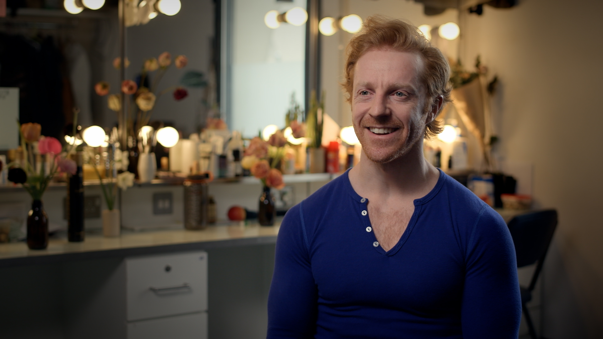 Steven McRae during an interview backstage in a dressing room.