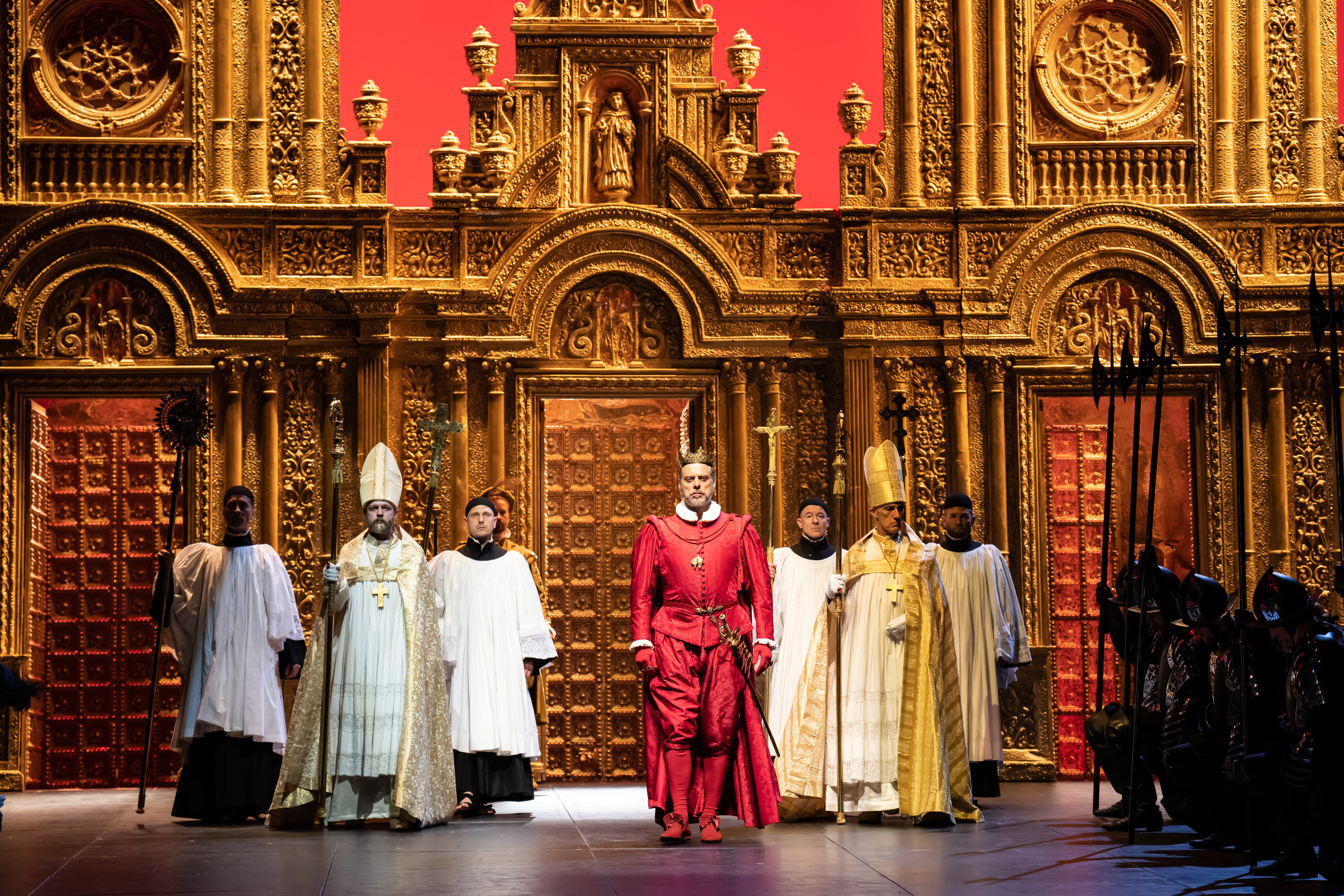 The cast of Don Carlo in full costume during a performance.