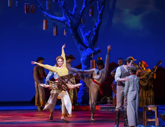 Meaghan Grace Hinkis dancing onstage with other Royal Ballet artists.