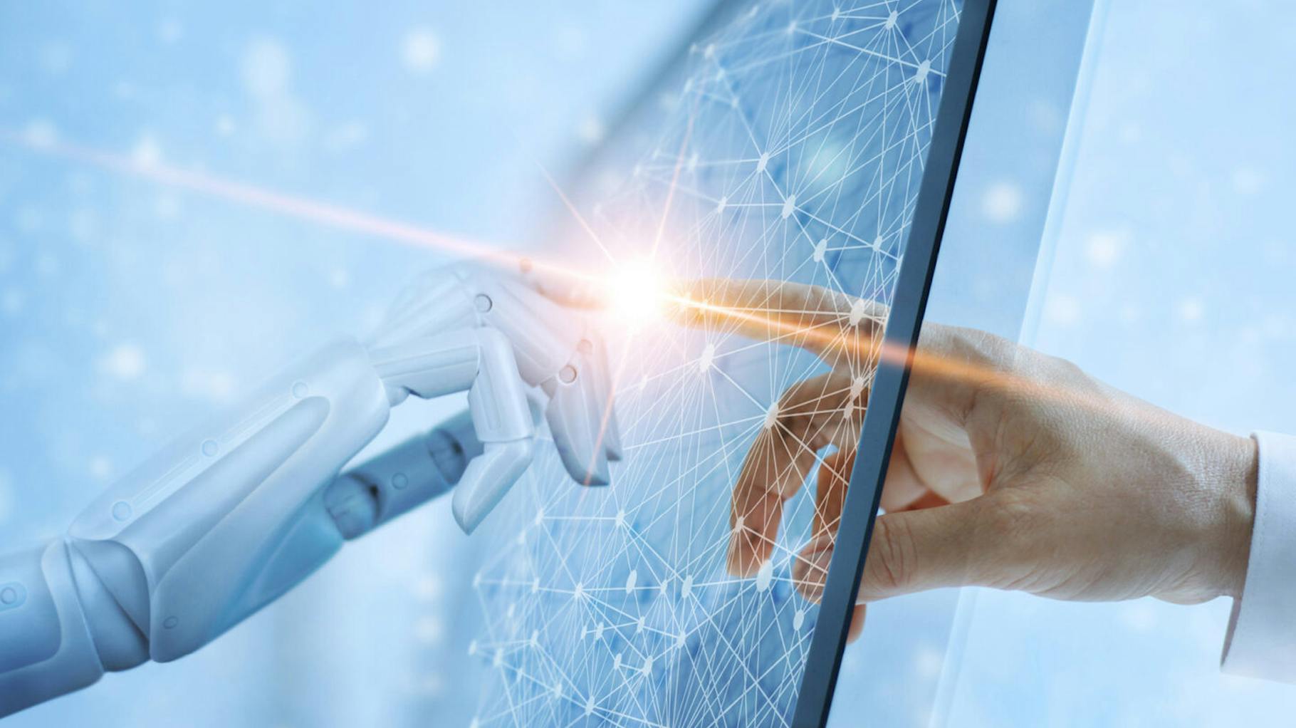 Das Bild zeigt den Zusammenhang zwischen KI und dem Menschlichen bei einer content marketing agency, indem sich der Finger eines Roboters und der eines Menschen berühren.