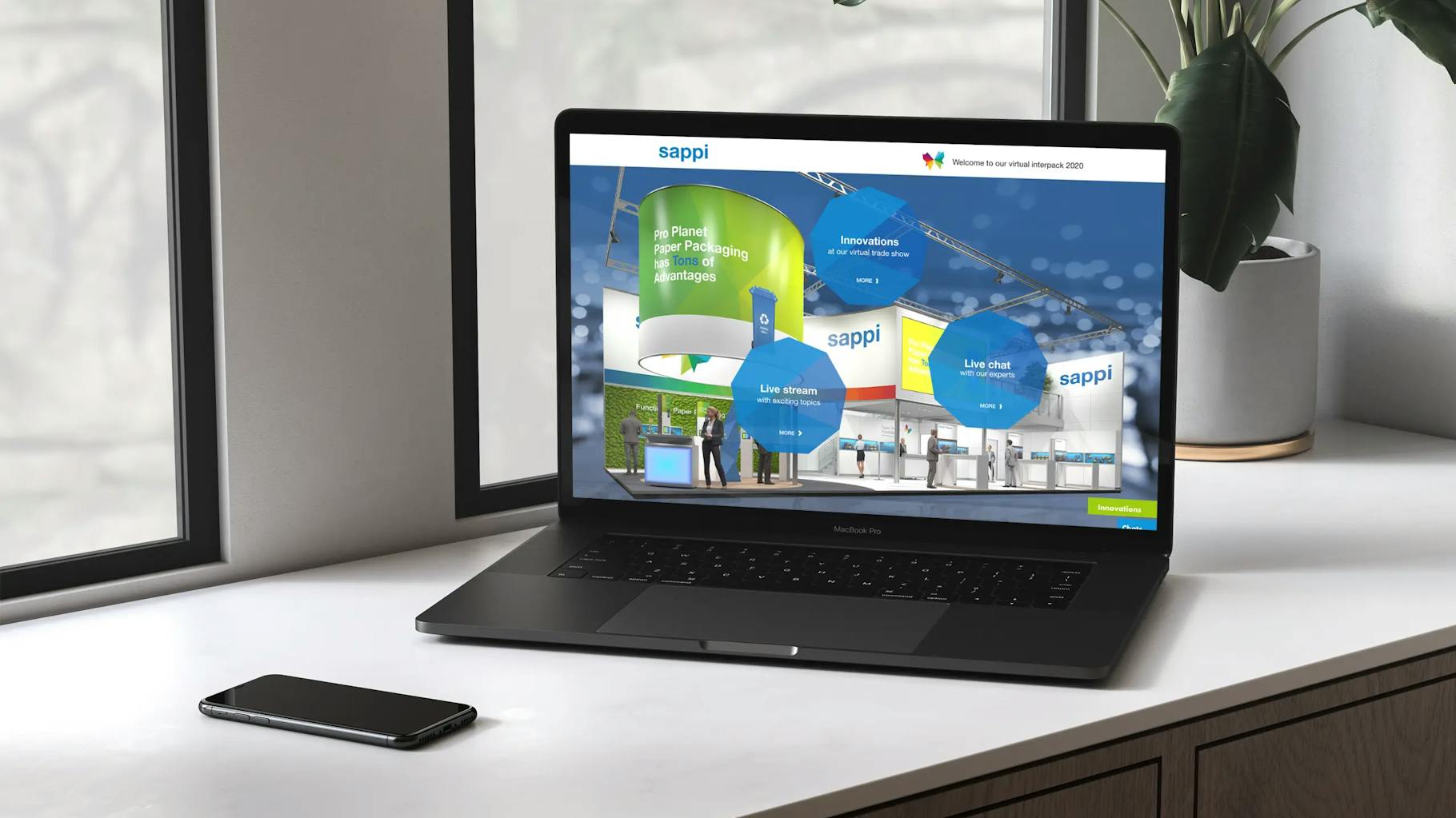 Ein Laptop zeigt die virtuelle Messe von Sappi