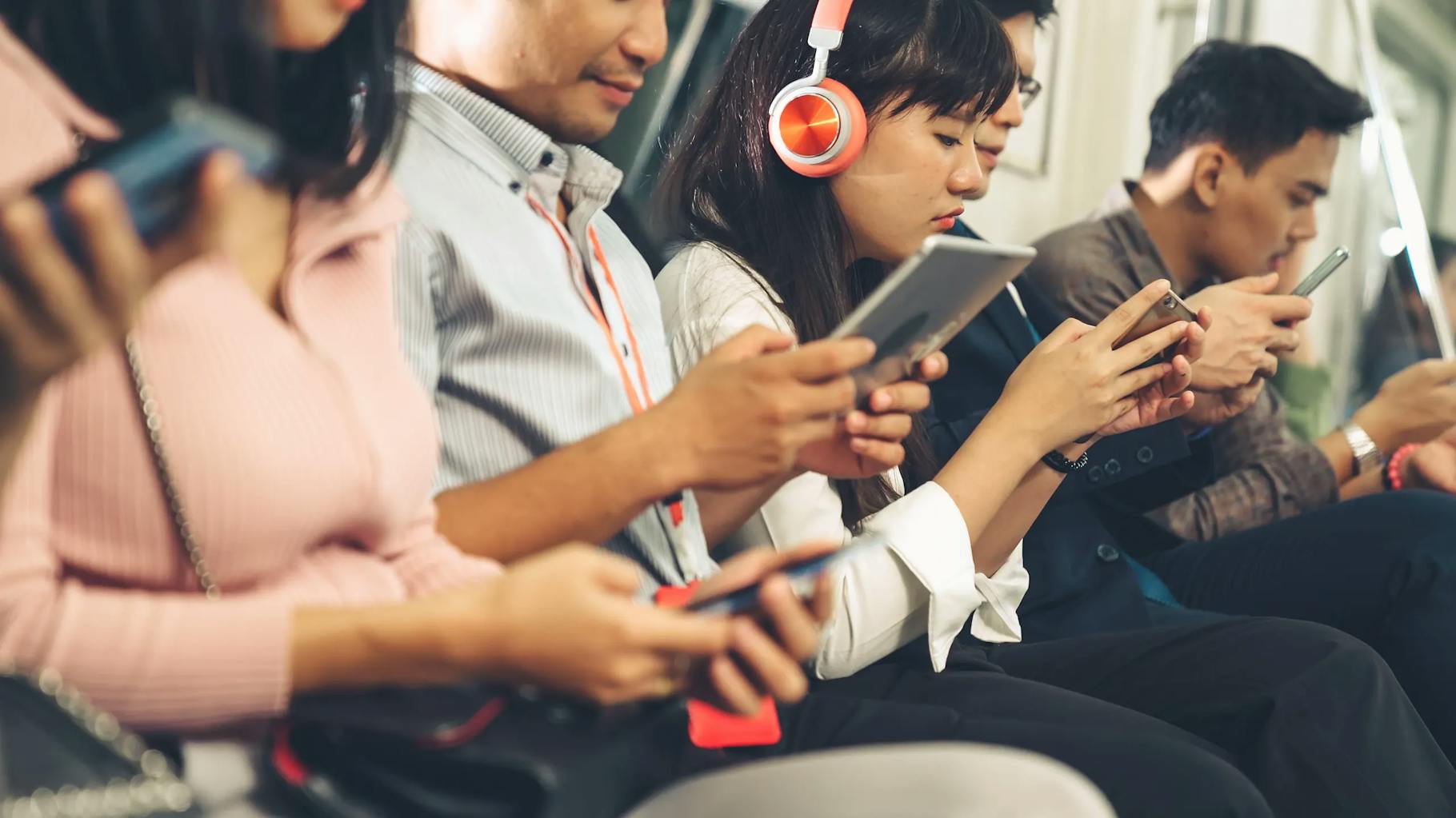The photo shows people in China sitting in the train on the topic of B2B communication.