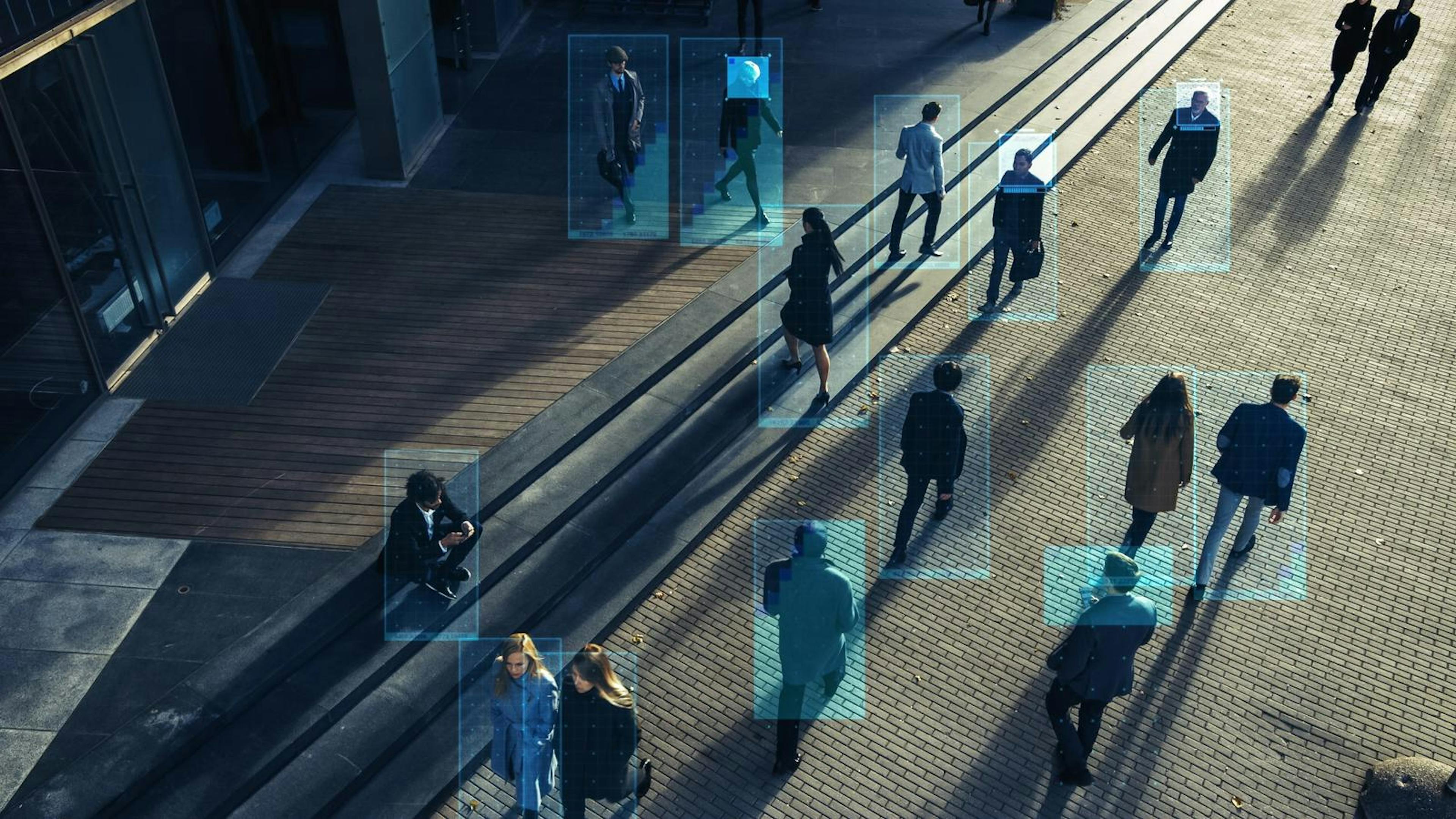 secure camera watching over people walking