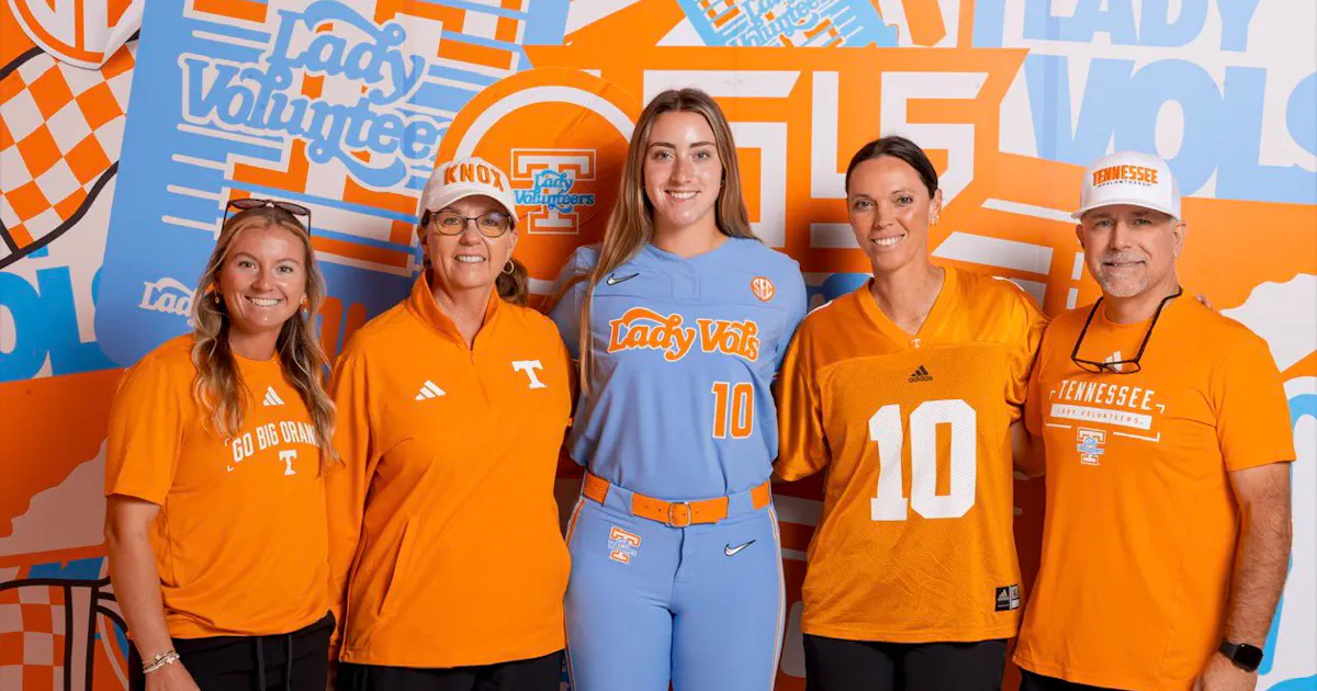 Megan Kuiper poses with Tennessee coaches