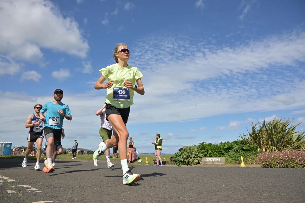 Ashleigh Harvie running outdoors during her Run for Recovery challenge across Australia.