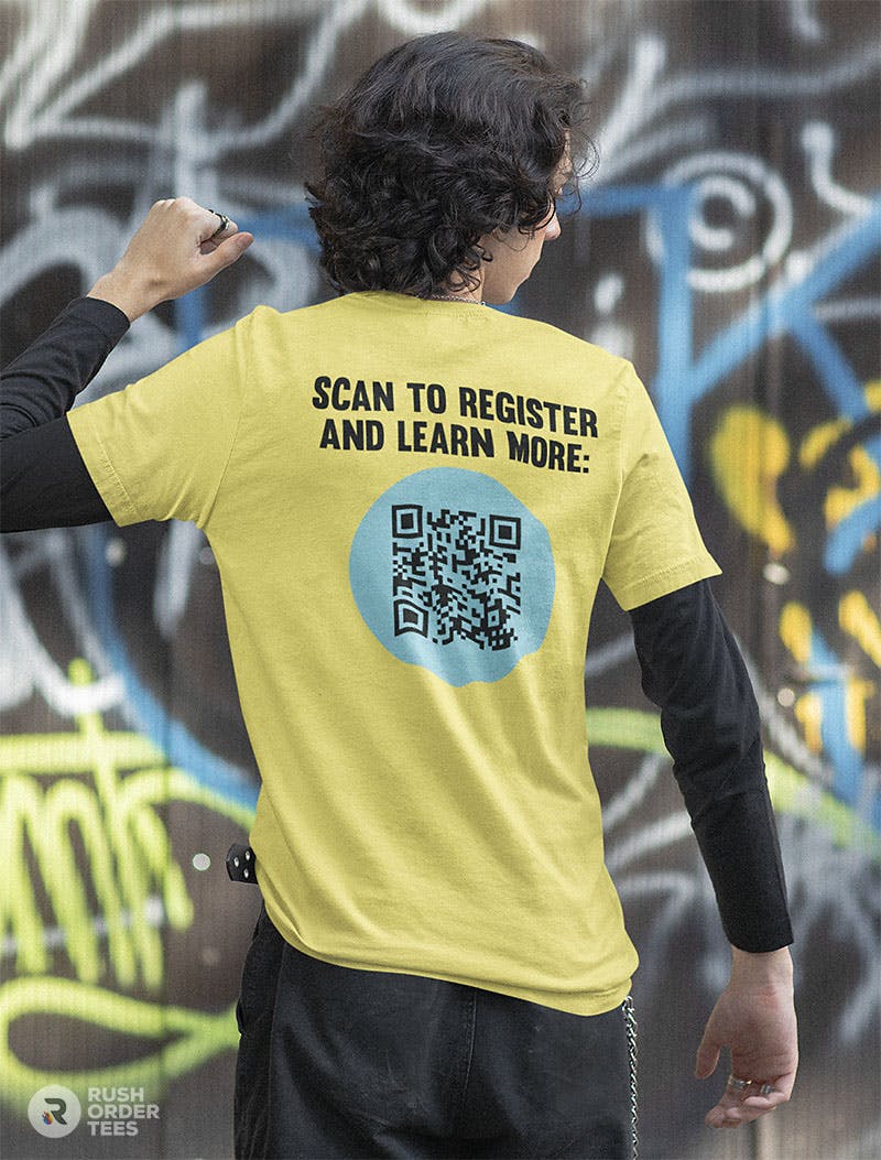 Young man earing a t-shirt with QR code on the back.