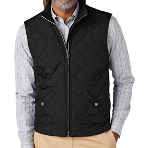 Male wearing deep black Brooks Brothers quilted vest