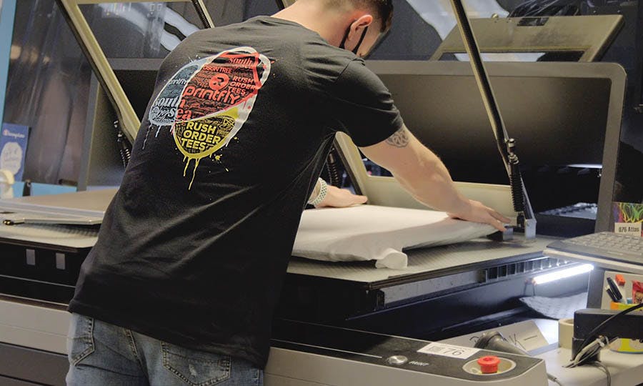 Joe setting up a DTG print.