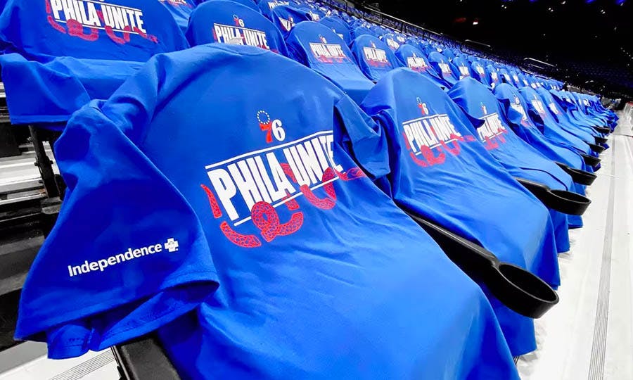 Phila Unite T-shirts draped onto all 20,000 seats of the Wells Fargo Center.
