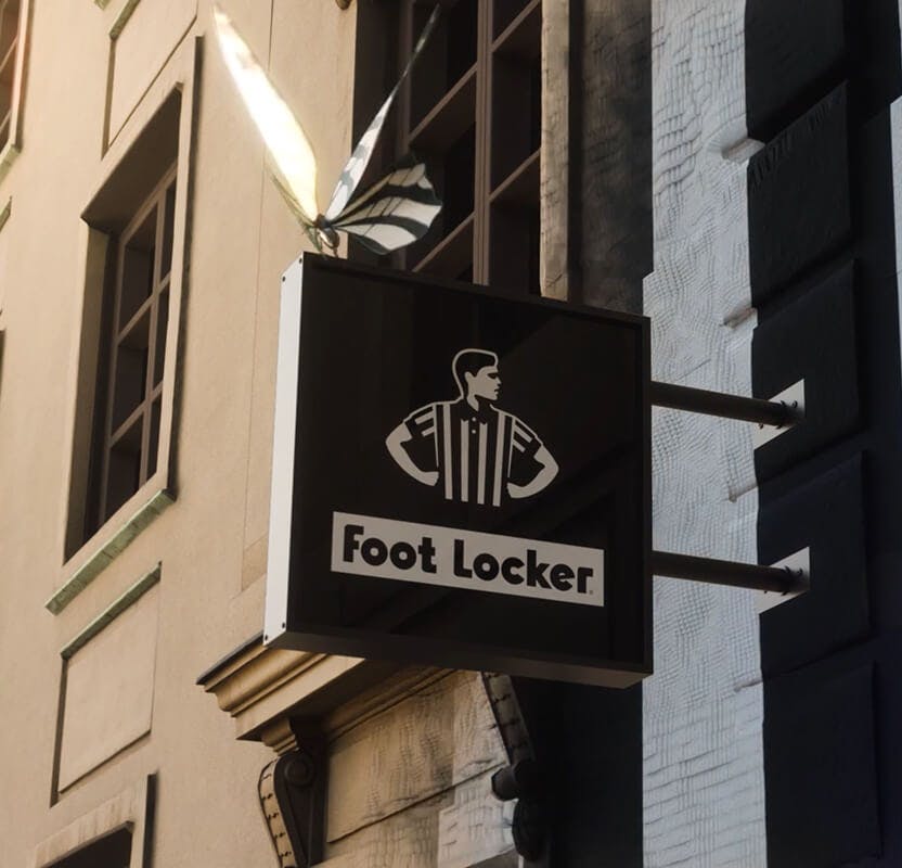 Foot Locker sign with a butterfly in black-and-white stripes.