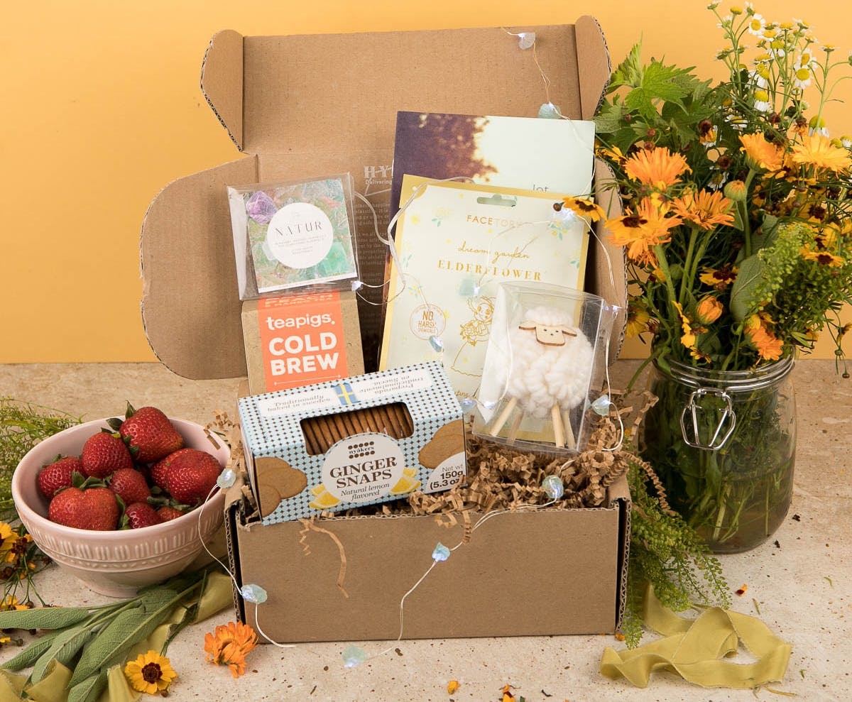 hygge box - self-care subscription box with products in it