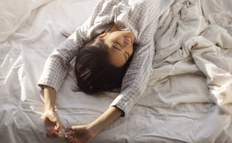 person getting quality sleep in bed