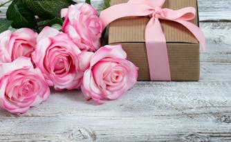 bunch of roses and gift box for mother's day