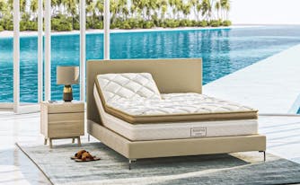 summer bedroom with a saatva solaire mattress