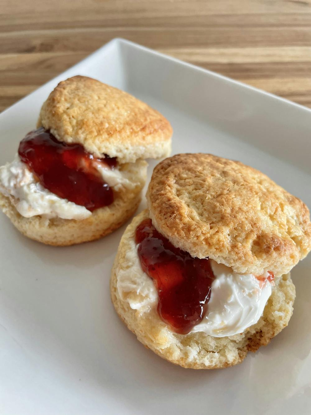 scones with clotted cream and raspberry jam