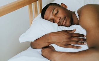 person sleeping in bed