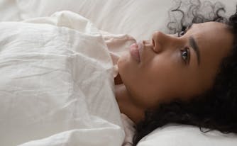 image of person awake in bed