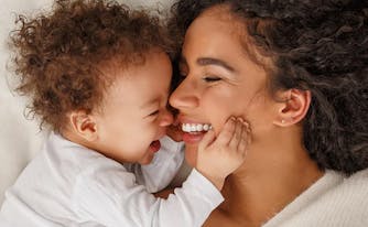 image of new mom in bed with baby
