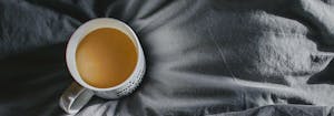 remove stains from sheets - image of coffee cup on sheets
