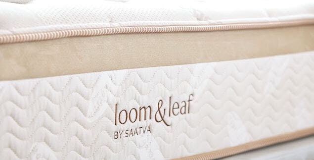 memory foam mattress reviews - closeup of saatva memory foam mattress