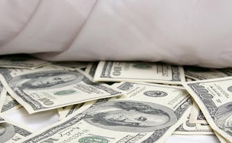 mattress financing - image of money under bed