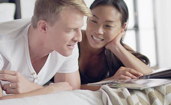 How to pick the best mattress - couple lying in bed