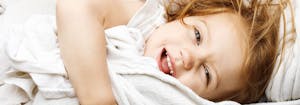 image of little girl in bed