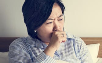 image of person with nighttime cough in bed