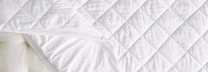 image of saatva dreams organic cotton mattress pad