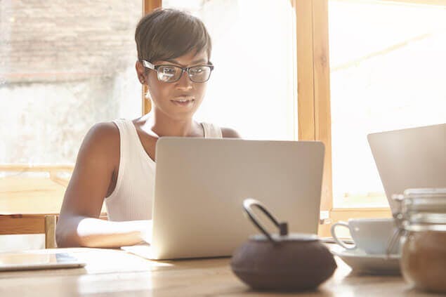 person sitting at computer