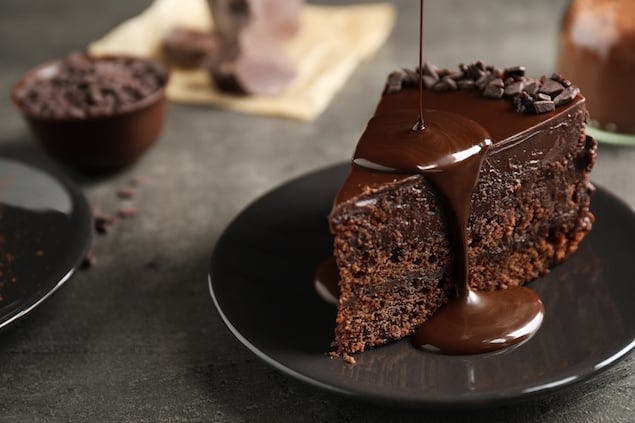 chocolate cake with chocolate syrup on top