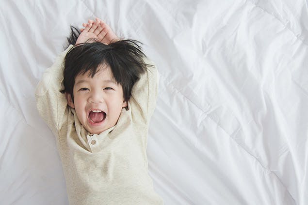 image of little boy in bed
