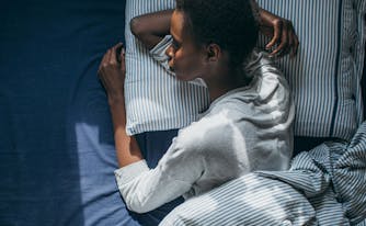 nighttime activities to help you relax - image of woman in bed