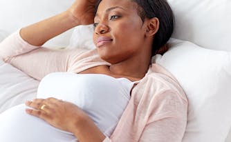 image of pregnant woman sleeping