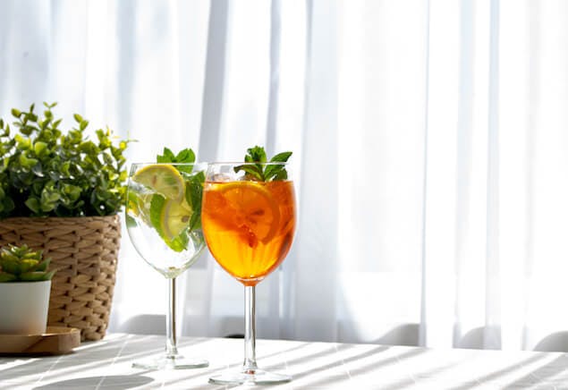 sleep myths - two cocktails on table inside home