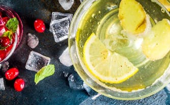 different cocktails against black backdrop