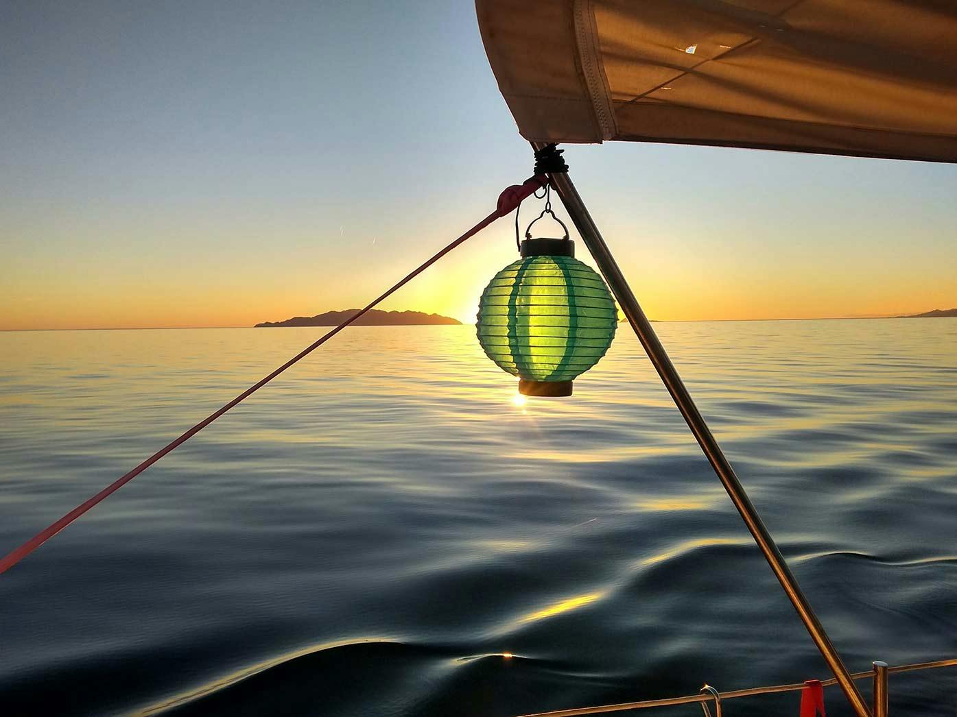 sleeping on a boat - image of sunset from boat