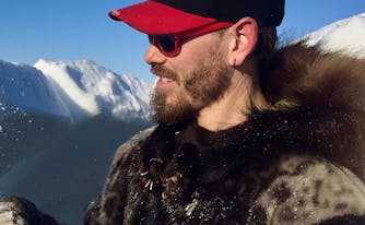 man building an igloo