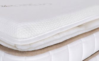 how to make mattress firmer - image of mattress topper